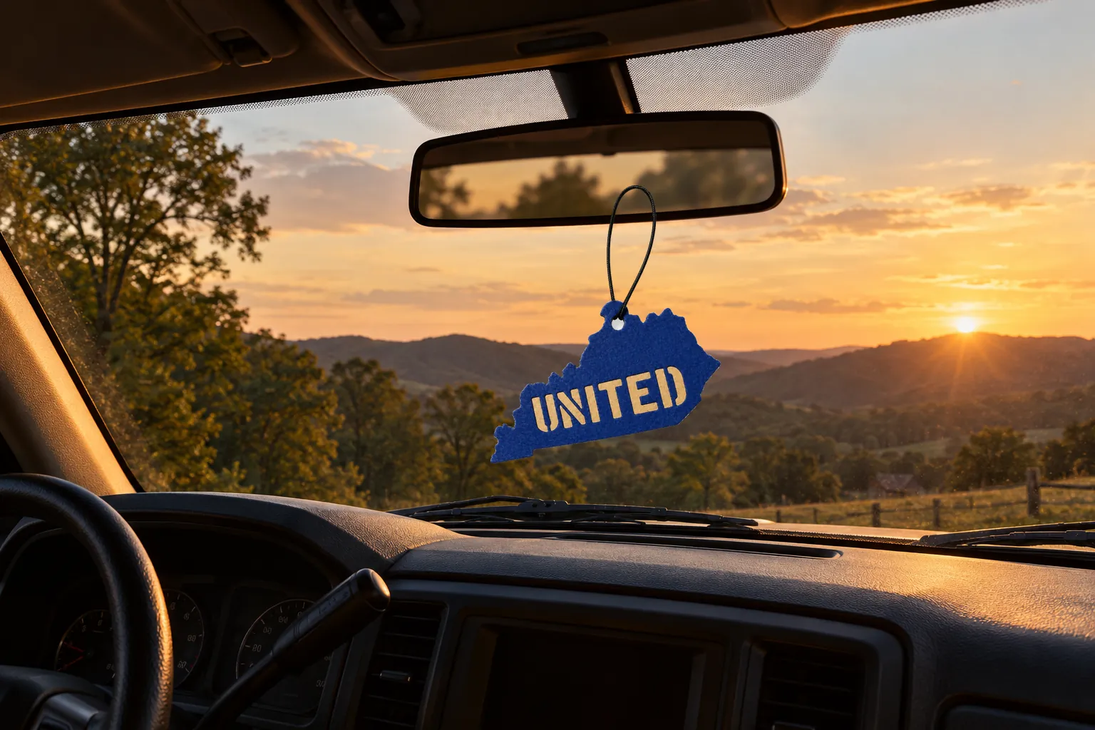 The air freshener hanging from a truck mirror